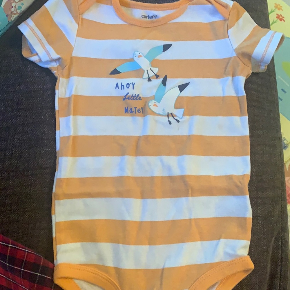 Orange and white striped shirt